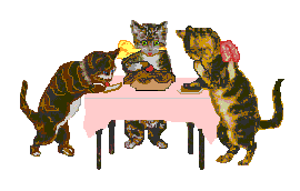 Three cats standing at a table, eating.